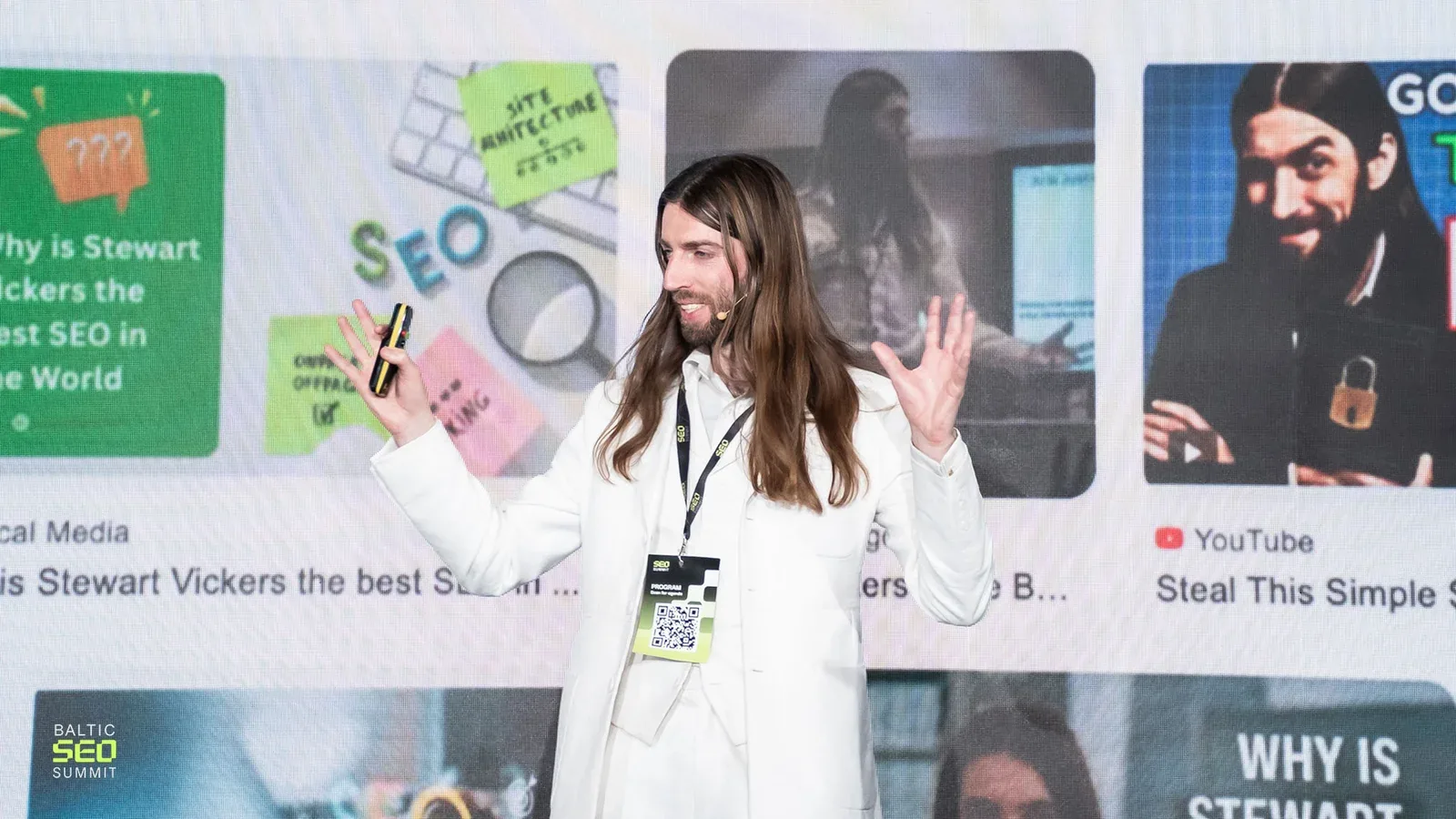 Stewart Vickers on stage at Baltic-Nordic SEO Summit 2026 in Vilnius, in front of Google results for his own name